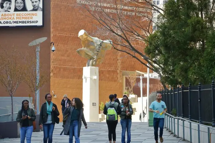 Students walk on the campus of the Borough of Manhattan Community College in this 2017 photo.